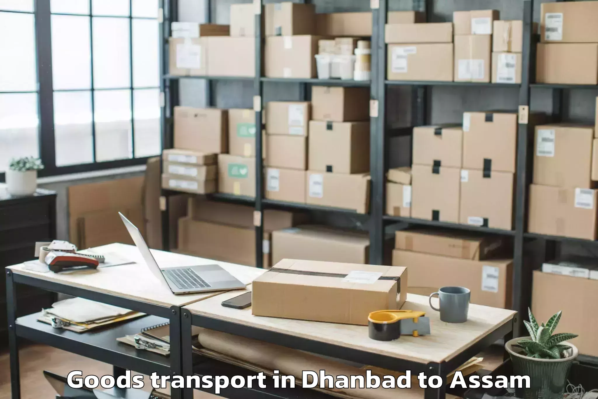 Easy Dhanbad to Tezpur University Goods Transport Booking